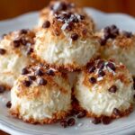 Chocolate coconut Easy No-Bake Moose Farts dessert balls served on a white plate, quick no-bake Canadian treat.