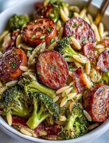 One-pan Chicken Sausage Broccoli Orzo dinner with parmesan and lemon zest.